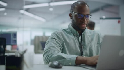 Poster - Modern Office: Portrait of Happy Black IT Programmer Working on Laptop Computer. Male Specialist Create Website, Software Engineer Develop App, Program, Video Game. Stress Free Inclusive Environment