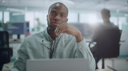 Poster - Modern Office: Portrait of Thoughtful Black IT Programmer Working on Laptop, Finding Solution, Solving Problems, Brainstorming. Male Software Engineer Wearing Glasses Develop App, Program, Video Game