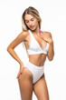 © F8  \ Suport Ukraine - Beautiful slim body of a woman in lingerie isolated on the white background