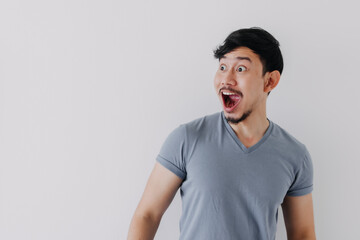 Wall Mural - Shocked and surprised face of Asian man in isolated on white background.