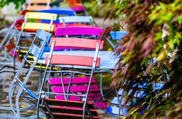 Poster - colorful folding chairs at a beergarden