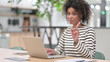 © Mustansar - Strict African Woman with Laptop saying No by Finger Sign