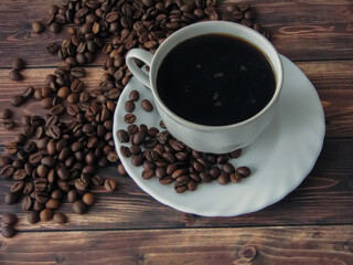 cup of coffee with beans