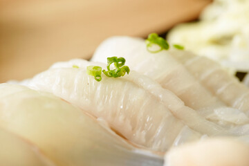 Sticker - White fish sushi on a plate 