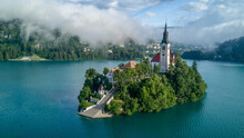 Church on lake blake island in slovenia