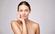 © Anatoly Repin - Beautiful Young Woman with Clean Fresh Skin standing over light grey background