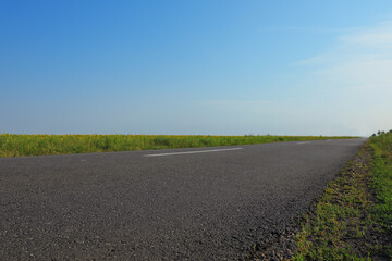 Beautiful view of empty asphalt highway on sunny day. Road trip