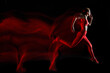 © Image Source RF - Female sprinter in motion