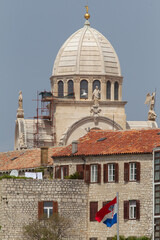 Sticker - Vertical shot of The Cathedral of St. James in Sibenik, Croatia with blue sky in background