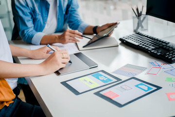 creative web designer planning application and developing template layout, framework for mobile phon