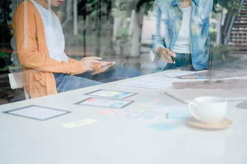 Creative Web Designer planning application and developing template layout, framework for mobile phone. User experience (UX) concept.