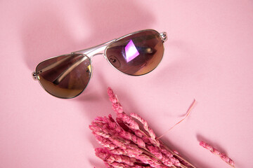 pink flower and eyeglasses