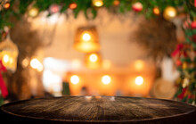 Empty Wooden Table And Blurred Christmas Background Of Abstract In Front Of Coffee Shop Or Restaurant For Display Of Product Or For Montage