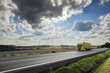 © Jaroslav Pachý Sr. - Landscape with a moving truck at sunset