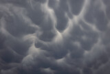 Fototapeta Sypialnia - Spectacular Mammatus clouds, mammatocumulus over Warsaw, capital of Poland