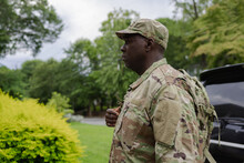 Black military man arrives home from service, active duty