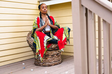 Black Woman Has Peaceful Meditation, Crystals 