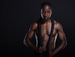 © Creative Flame - Fit African American man with muscles posing in studio