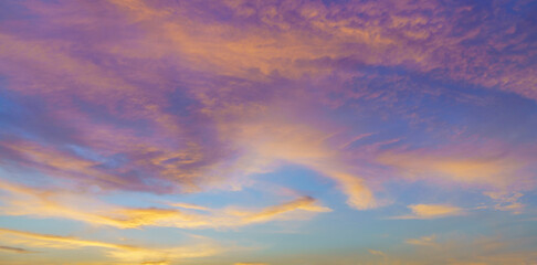 Poster - The colorful clouds in the sky at dusk