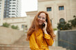 © PinkCoffee Studio - Young beautiful woman talking on the phone outdoor