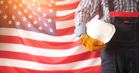 Worker on nation flag background. Labor day holiday concept. USA