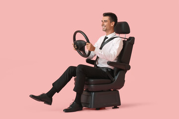 Sticker - Businessman in car seat and with steering wheel on color background