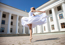 Young Ballerina Dancing In The Street