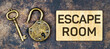 Escape room game concept, old vintage key and padlock on a rusty grunge metal background. Web banner.