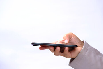 Canvas Print - Businessman using smartphone on white background and technology connection concept