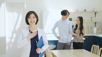 Canvas Print - 家の説明をする不動産営業マンと夫婦