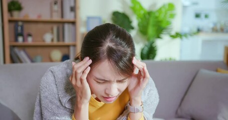 Wall Mural - woman has headache at home