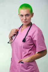 nurse with pink scrubs, green hair and positive attitude