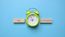 A Green Alarm Clock And The Inscription: "time Management". Time Management Symbol