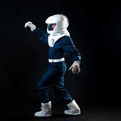 Wall Mural - An astronaut walks in low-gravity conditions. The hero