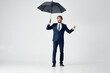 © SHOTPRIME STUDIO - business man in suit umbrella rain protection weather