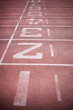© peterkai - Running track in sport stadium.
