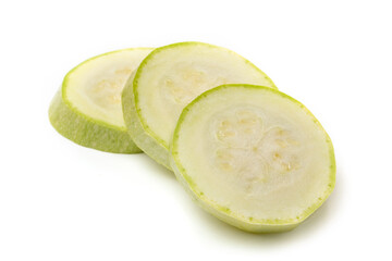 Wall Mural - Slices of white zucchini on a white background.