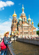 Girl tourist visits landmark of Saint Petersburg, Russia, Europe. Travel concept.