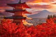 Japan pagoda. Mount Fuji in Japan. Pagoda near Fujiyama volcano. Japan in autumn day. Landscape with red Japanese maple. Nature Japanese. Red maple tree in front of Mount Fuji. Fujikawaguchiko