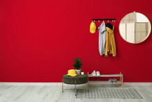 Stylish Interior Of Modern Hall With Red Wall