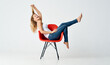 © SHOTPRIME STUDIO - woman sitting on red chair movement posing models