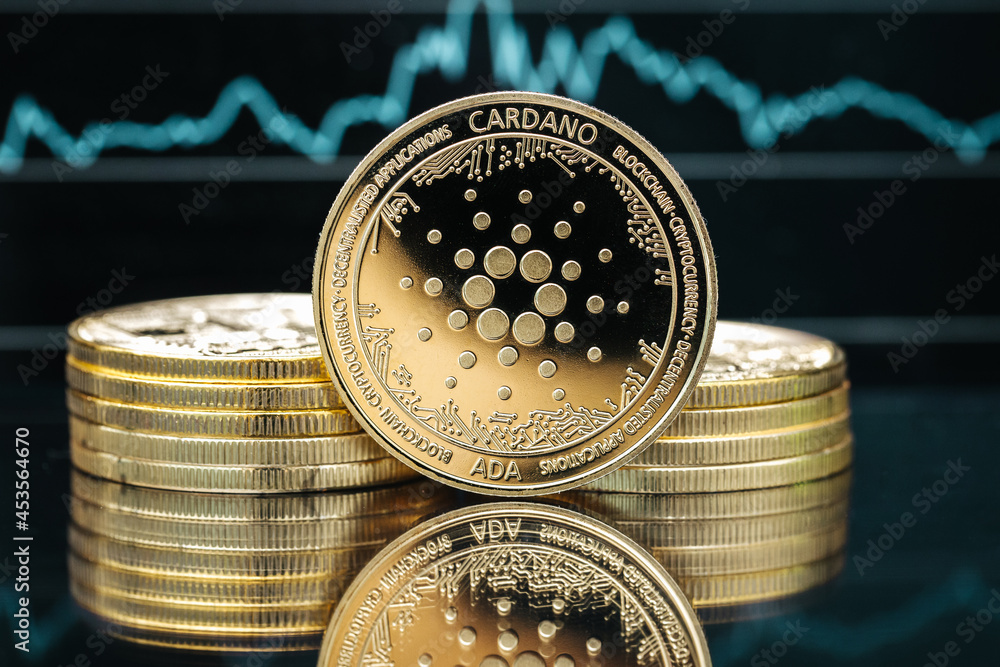 Cardano Ada cryptocurrency coin close-up, in front of a price chart
