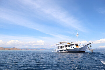 Beautiful view of phinisi boat floating on the sea