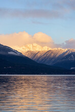 Sunrise In The Pacific Northwest Over The Olympic Mountains With Fresh Snow In The Hills And Early Morning Light