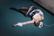 Crime scene imitation. Strangled chambermaid lying on the floor.