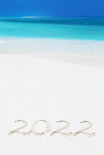 Handwritting Inscription Numbers 2022 On Perfect Tropical Sandy Beach