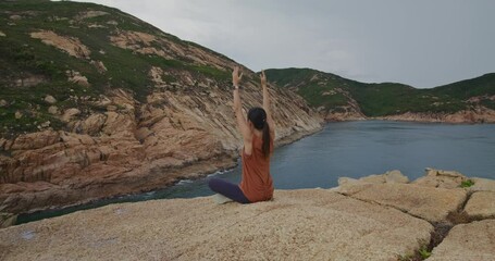 Sticker - Woman enjoy the yoga at natural landscape