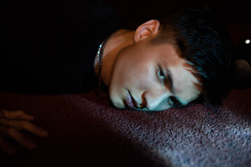 Fashion portrait of young elegant boy . Colored background, studio shot. Street, urban modeling, portrait, fashion photo.