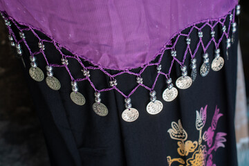 Poster - Hanging silver coins belly chain in a female's costume