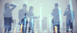 © Who is Danny - Teamwork and trade concept. Group of young businesspeople working together on bright city background with glowing forex graph. Double exposure.